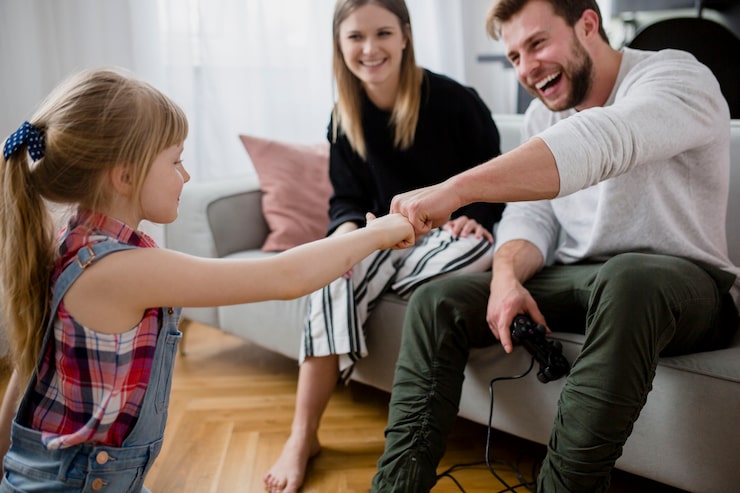family-bumping-fists_23-2147800168